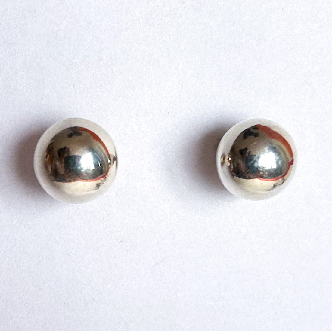 Aretes esferas bombeadas