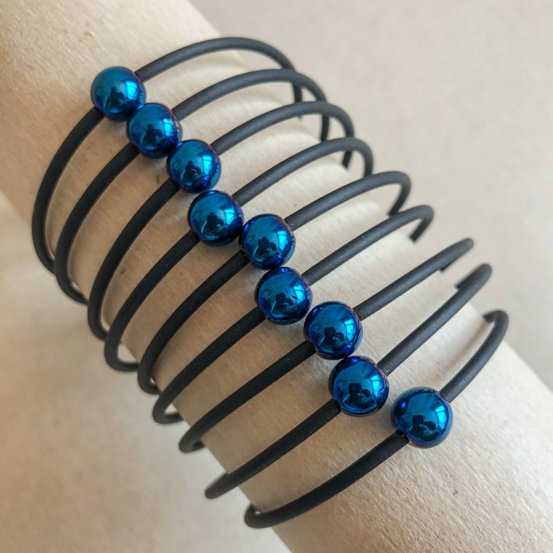 Brazalete caucho y bolas azules